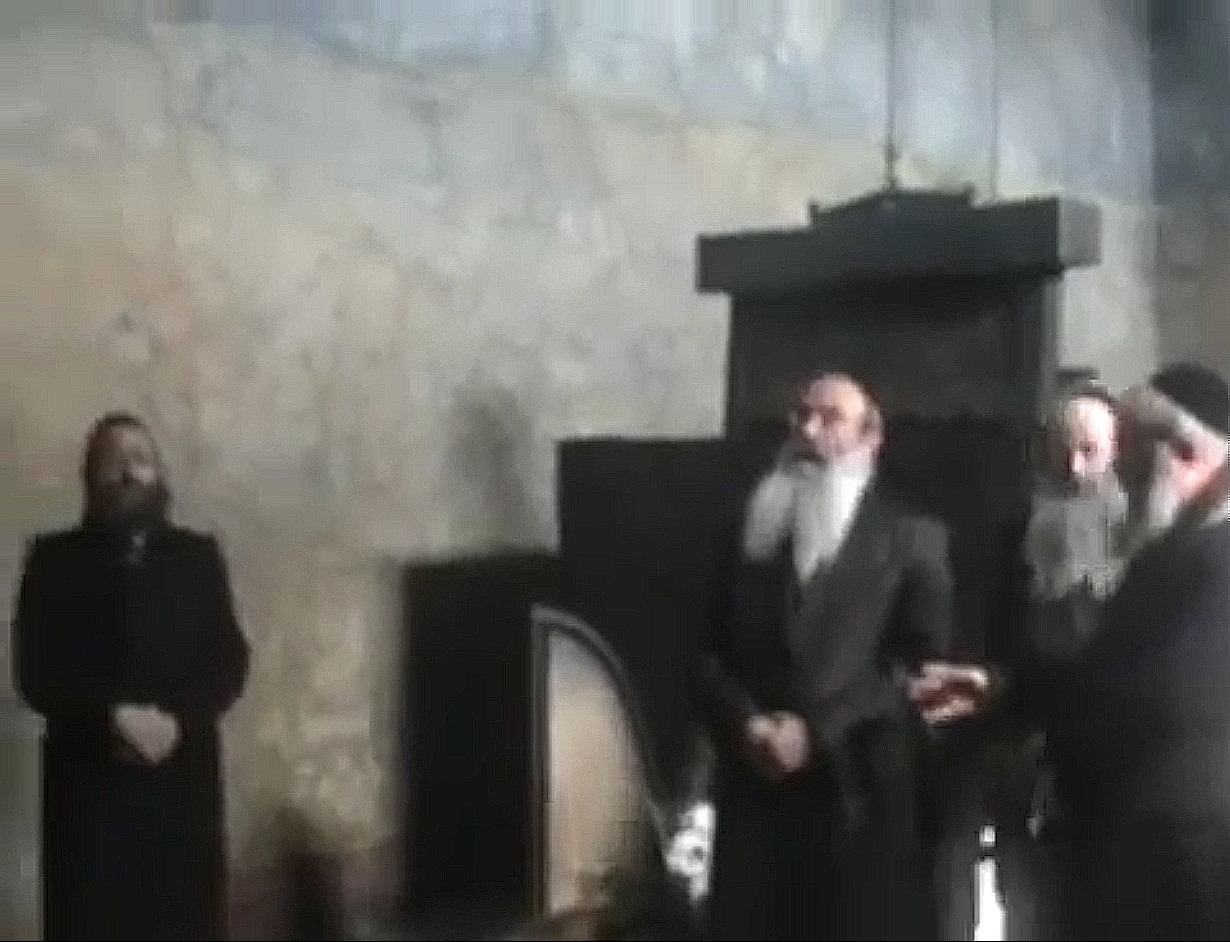 אב הרחמים שוכן במרומים <br> AT THE CREMATORIUM